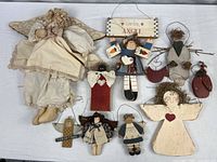 Group shot of all ten hanging decorations displayed on white surface