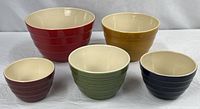 Front view of all five nesting bowls