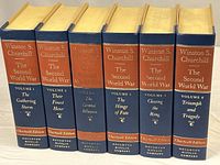 Front view of all six volumes showing titles and publisher