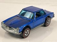 Front left view of blue Hot Wheels Mercedes-Benz 280 SL showing grille, hood and wheels