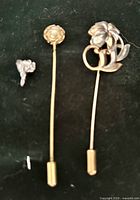Group view of three pins