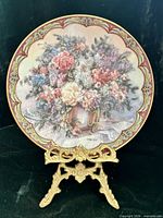 Front view of Lena Liu "Magic Makers" porcelain plate on stand