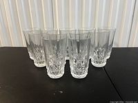 Group of 10 crystal highball glasses arranged in two rows
