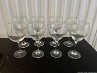 Eight balloon wine glasses side view