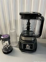 Complete Ninja Foodi Power Blender system with pitcher attached to base, smoothie bowl maker and single-serve cup shown