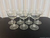 All seven Libbey 3002 cocktail coupe glasses grouped together