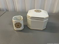Octagonal lidded jar and square tumbler showing design and condition