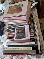 Stack showing top slipcased Time-Life books and additional art books