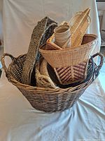 Group shot of multiple baskets inside large round basket