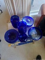 Full set showing stacks of bowls and plates, plus serving bowl and pitcher