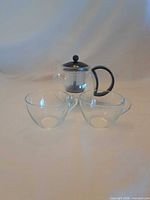 Full set showing teapot and two matching cups