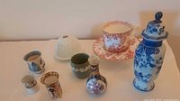 Group shot of all eight china pieces