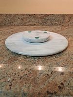 Marble cake stand side view showing base
