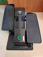 Full view of Cubii elliptical on included mat