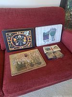 All placemats and coaster boxes grouped on couch