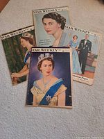 Four Star Weekly magazines spread on floor showing covers