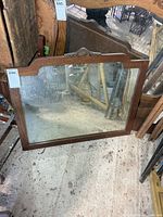Front view of wood framed mirror