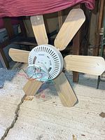 Front view of ceiling fan showing blades and housing