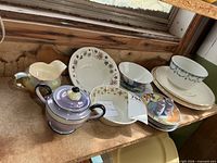 Group view of entire lot on shelf