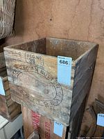 Front view showing CANADIAN BUTTER MANITOBA stamp and overall crate condition