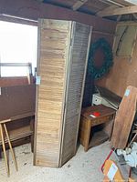 Full view of bifold doors standing upright showing both panels