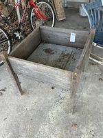overall view of wooden dough rise table standing on concrete