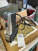 Full view of Grundig Execumate recorder on base with power cord visible