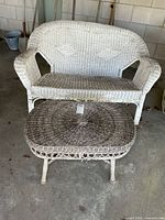 Front view of loveseat and coffee table showing overall style and color