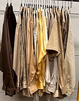 Front view of entire rack of beige/brown shirts
