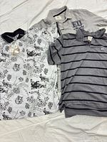 All three XXXL polo shirts laid flat