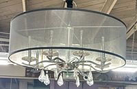 Side view showing drum shade, eight sockets and crystal drops