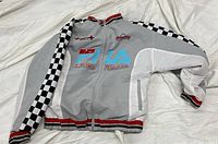 Front view of FILA Linea Italia jacket showing overall design, logos, colors