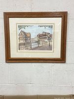 Full view of framed watercolor on wall
