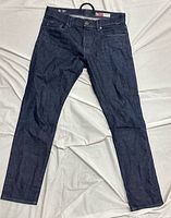 Full front view of dark indigo G-Star Raw jeans