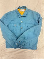 Front view showing color, pockets and buttons