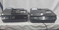 Front view of both HP OfficeJet 4630 printers side by side