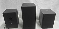 Front view of three subwoofers