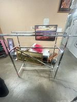 Full view of chrome double rack showing twin bars and base structure