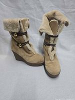 Full view of both boots showing overall style and condition