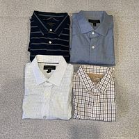 All four folded shirts arranged in grid