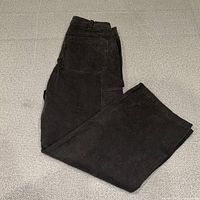 Jeans folded to show rear pocket and leg