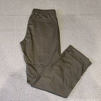 Full length view of olive green Abercrombie & Fitch chino pants