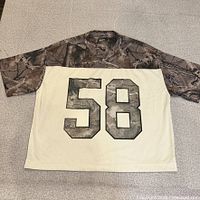 Full view of Hollister camo football jersey style crop shirt with number 58