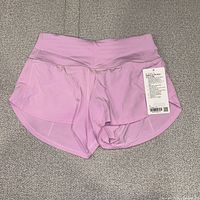 Front view of pink Lululemon Speed Up HR Short with tags
