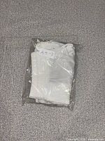 Shorts sealed in clear plastic bag