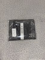 Shirt sealed in original plastic packaging