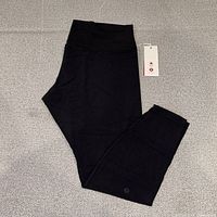 Full view of black Lululemon Align HR Pant folded showing overall appearance
