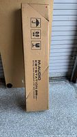Closed brown shipping carton labeled M-Audio Keystation 88es