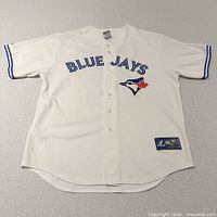 Full front view of white Majestic Blue Jays jersey
