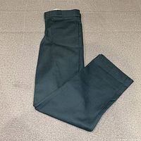Pants folded to show color and fabric